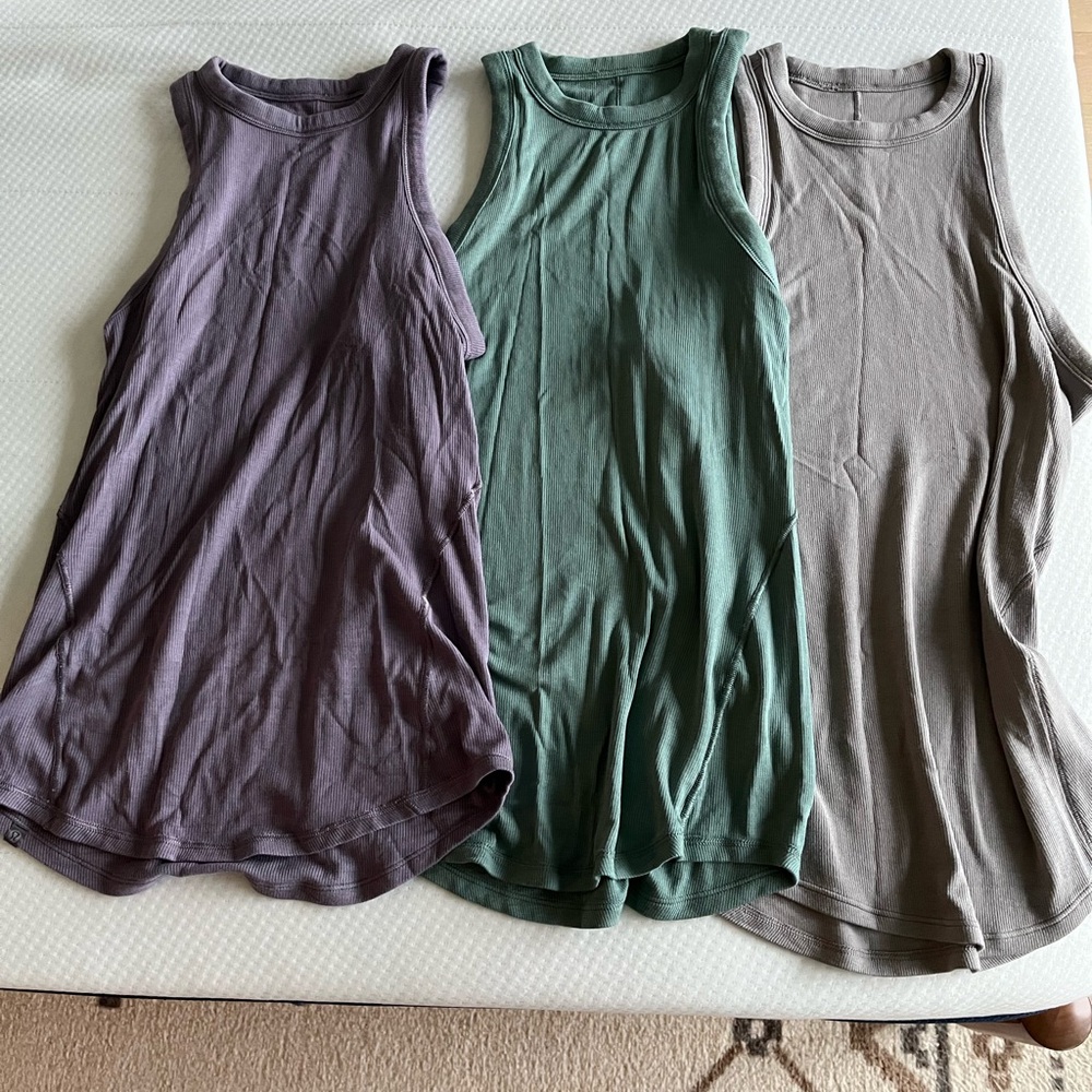 Three lululemon athletica Hold Tight Tank Tops size 4